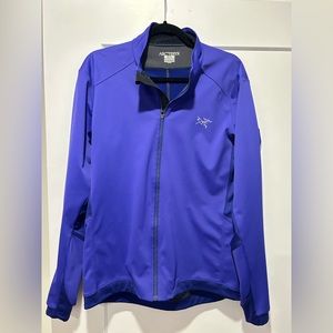 Arcteryx Royal blue running jacket.